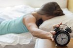 wake-up-of-a-girl-stopping-alarm-clock-royalty-free-image-1569936876.jpg