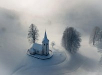 church surrounded by snow.jpg