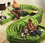 70's s-shaped green sectional couch.jpg